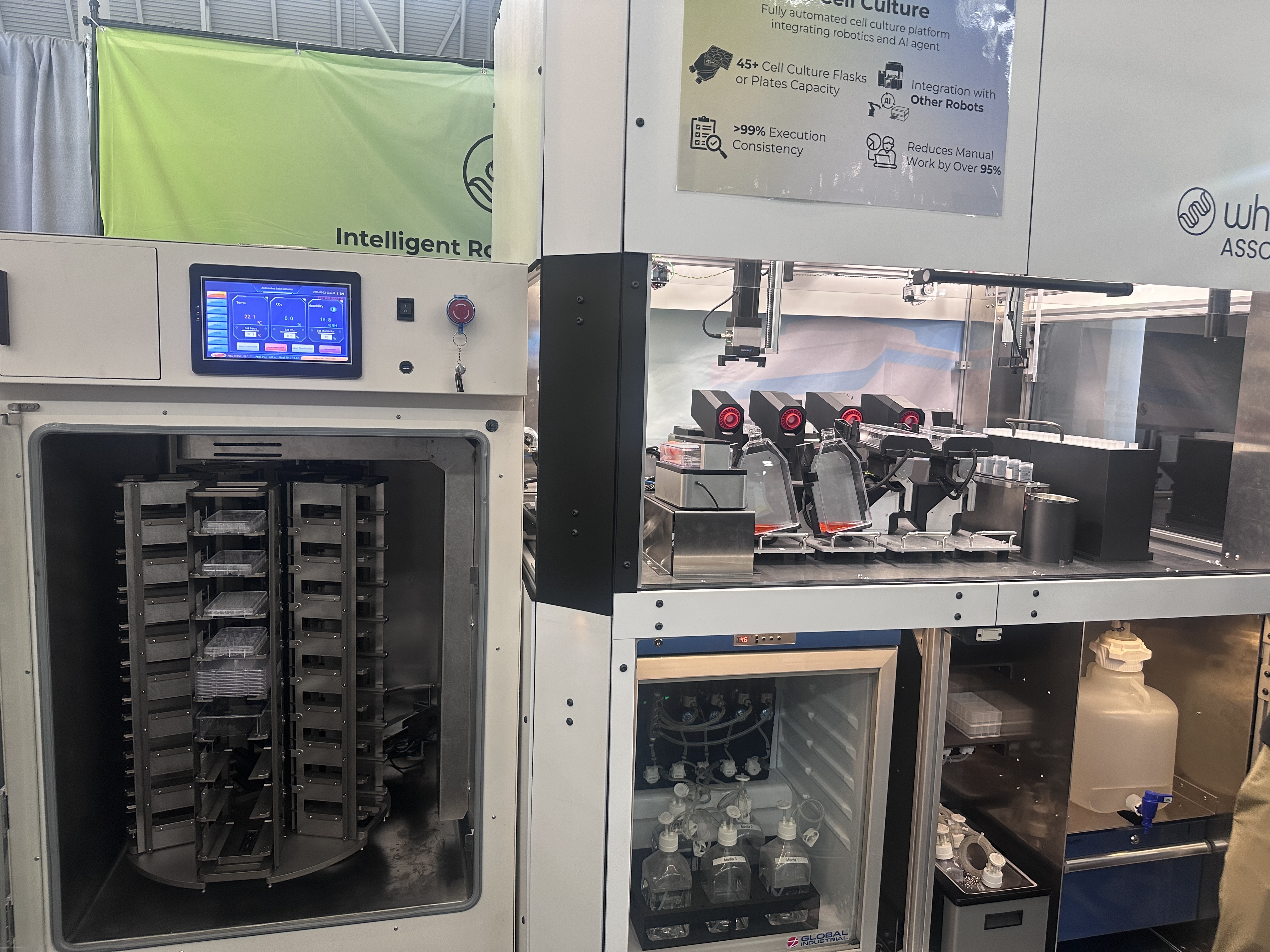 Whelix Associan full system — automated incubator, Teknician workspace, and product spec sign