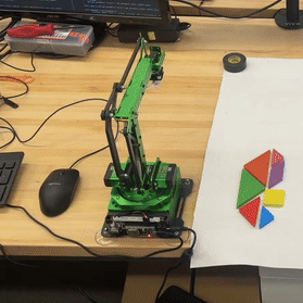 Intelligent Robotic Tangram Puzzle Solver